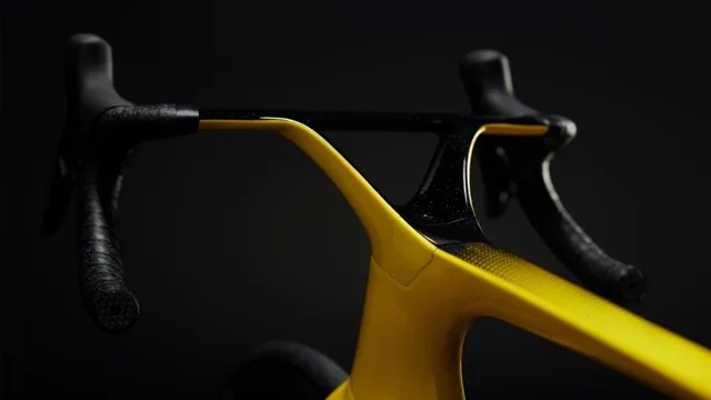 Client reference photo — carbon handlebar close-up of a yellow road bike